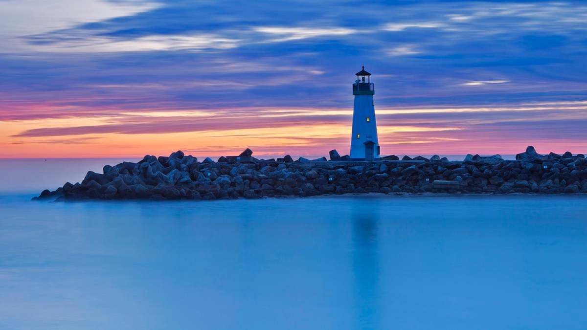 a sunset over a body of water