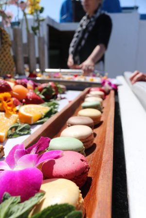 a close up of food on a cutting board with a cake